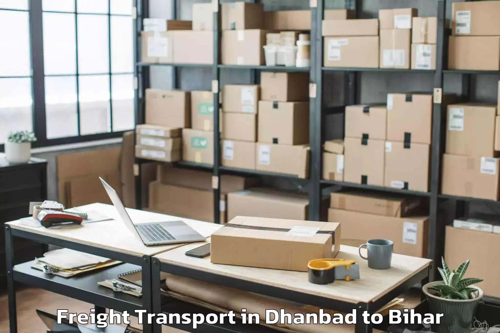 Easy Dhanbad to Wazirganj Freight Transport Booking